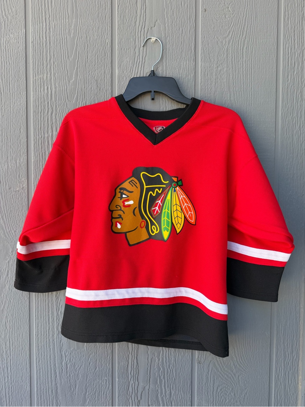 Kids Red Hockey Jersey with Native Logo - Youth Top